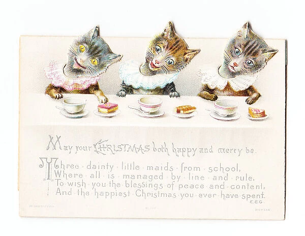 Three cats with moveable heads on a Christmas card