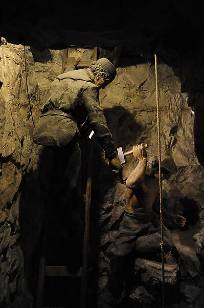Mining. Shaft sinking by hand with hammer and wedge. Diorama