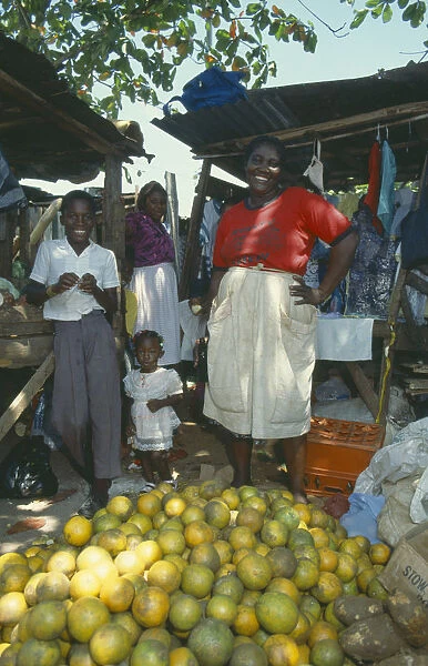 10056600. WEST INDIES Jamaica Ocho Rios Fruit stall in the market with two female vendors