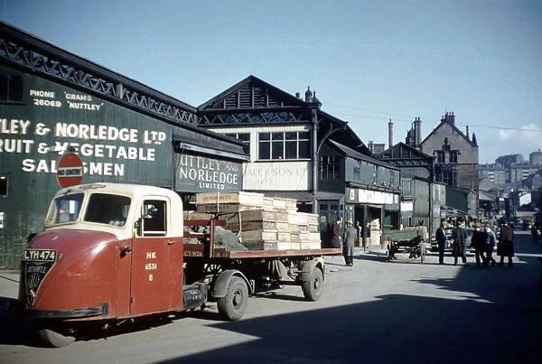 Castlefolds wholesale fruit and vegetable market, Broad Street showing (left) Uttley and Norledge Ltd. fruit and vegetable merchants, 1958