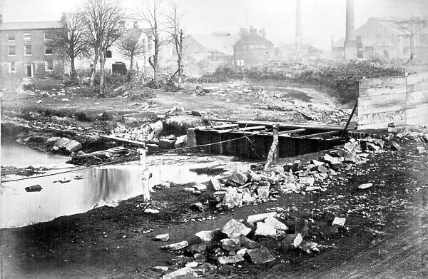 Sheffield Flood, Remains of the Shuttle House, residence of James Sharman, head of Bacon Island (formed by the River Don dividing into two branches), 1864. House in background, left, is The Grove