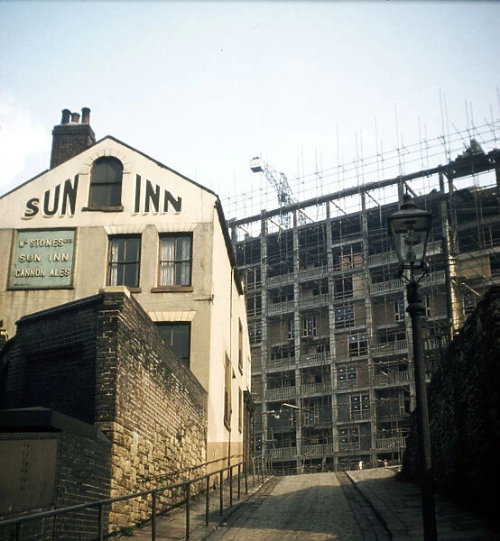 Sun Inn, South Street showing Park Hill Flats under construction