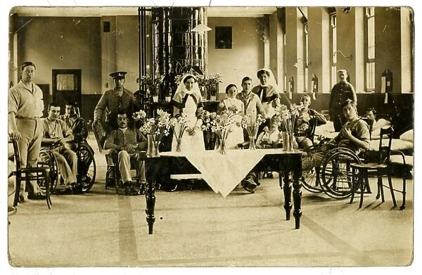 Wounded soldiers and staff in hospital ward (presumed to be The Sheffield Royal Hospital), 1916