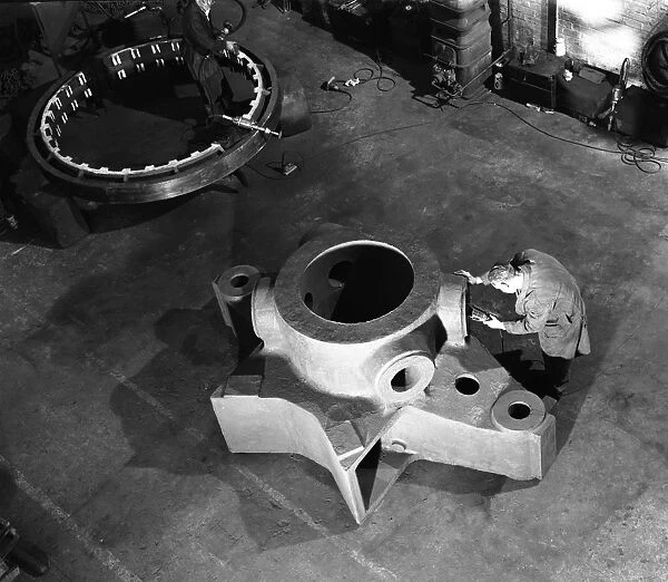 Inspecting a large precision steel casting, Sheffield, South Yorkshire, 1961. Artist