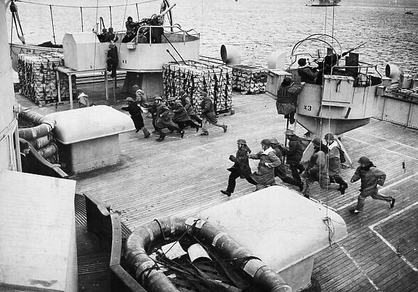British and American gunners on the Queen Mary during an exercise