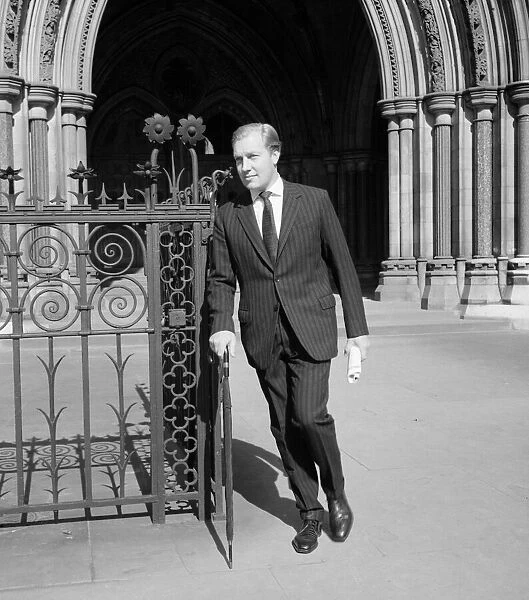 Mr John Aspinall, the millionaire gambler, leaves court after the adjourned hearing of an