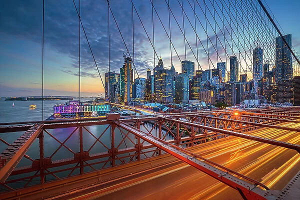 New York City, Brooklyn Bridge, Lower Manhattan views seen through suspension wire