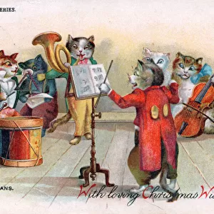 Cats playing musical instruments on a Christmas postcard