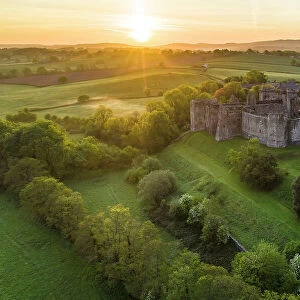 Sunrise over Raglan Castle in the county of Monmouthshire, Wales, UK. Spring (May) 2022