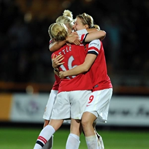 Arsenal Ladies Triumph: Steph Houghton, Ellen White, and Kim Little Celebrate FA WSL Continental Cup Victory