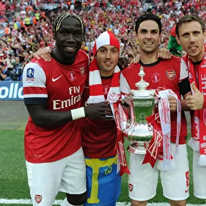 Arsenal's Celebratory Moment: Santi Cazorla, Mikel Arteta, Bacary Sagna, and Nacho Monreal Rejoice after FA Cup Victory over Hull City (2014)