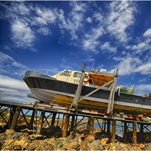 Crayfish trawler in dry dock, Nelson bay, Tarkine area of the west coast, Tasmania