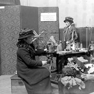 The Womens Emergency Corps. Women making knitted garments. 1914 - 1918