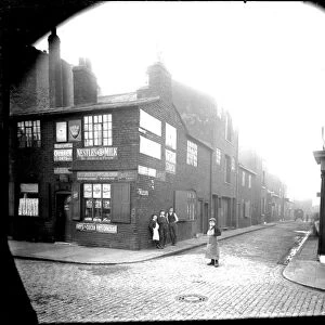 Ward Street from Bowling Green Street. No 5, Bowling Green Street, Miss Susannah Ellis, Shopkeeper (left). No 7, Joseph Henry Booths Beerhouse, (right), probably called known as Brunswick P. H. hence the sign