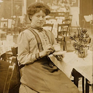 Woman drinking in the cafe at the Olympia Skating Rink, Sheffield, c. 1911