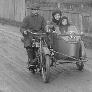 Bill Brunell riding a Clyno motorcycle and sidecar, c1920. Artist: Bill Brunell