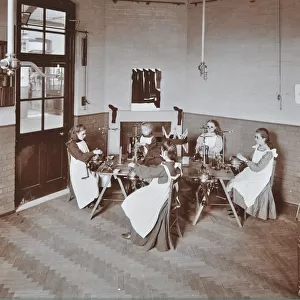 Girls knitting socks by machine at the Elm Lodge School for Blind Girls, London, 1908