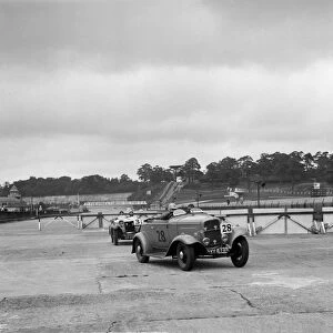 J Clelands Ford V8 and JH Barkers Riley Lynx at the chicane, JCC Members Day, Brooklands, 1939
