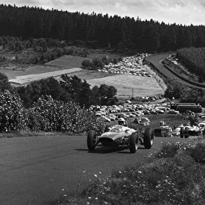 1963 German Grand Prix - Start: John Surtees, 1st position, leads Jim Clark, 2nd position, action