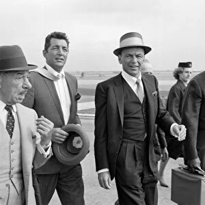 American musician and screen legend Frank Sinatra arrives at Heathrow airport in London