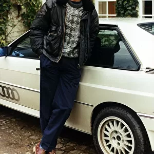 David Gower ex England Player standing beside white Audi Quatro. 24th January 1990