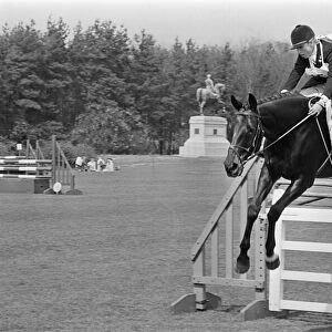 Princess Anne, The Princess Royal, competing in a showjumping event t Windsor Great Park