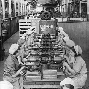 Women labourers working in the Darwins Ltd, (steel) Magnet and Razor Blades Factory