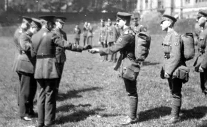 Lieut. Turnell distributing half crowns before leaving the 3rd Northern General Base Hospital, Broomhall, World War I Lieut. Turnell distributing half crowns before leaving the 3rd Northern General Base Hospital, Broomhall, World War I